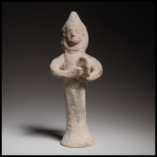 Terracotta statuette of a woman playing the tambourine