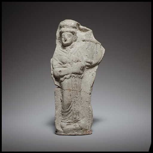 Standing female kithara player