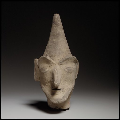 Male head wearing a helmet