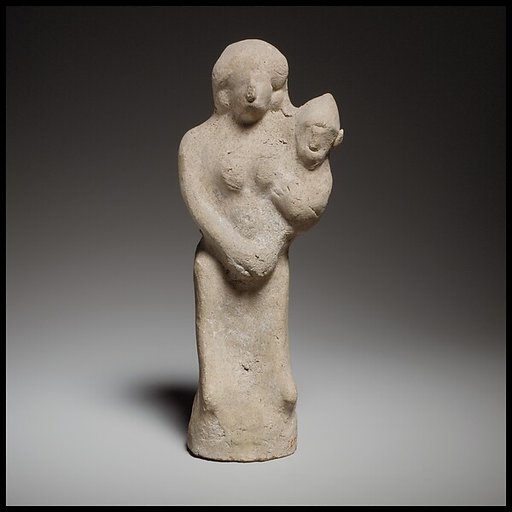 Seated female figurine holding a baby