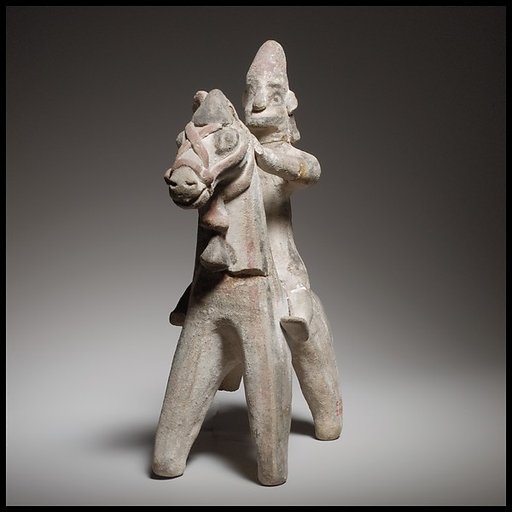 Horse and rider figurine