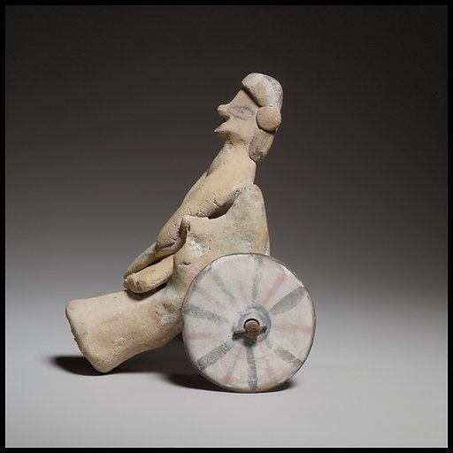 Model of a cart with a human figure