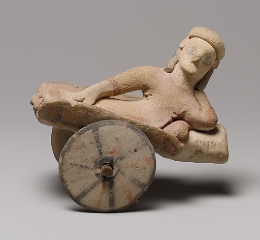 Model of a cart with a human figure