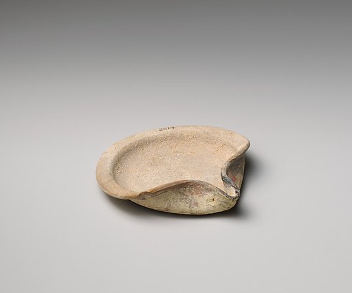 Terracotta saucer-shaped lamp