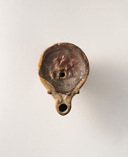Terracotta oil lamp