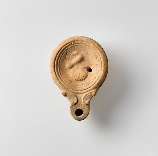 Terracotta oil lamp