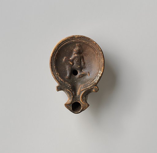 Terracotta oil lamp
