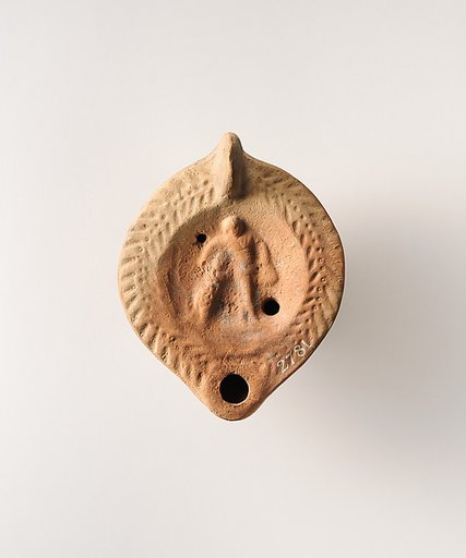 Terracotta oil lamp