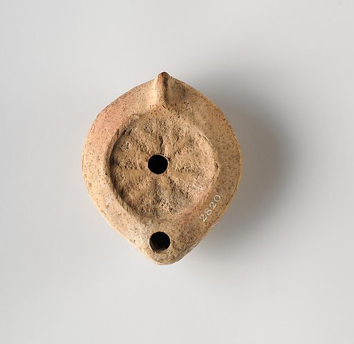 Terracotta oil lamp
