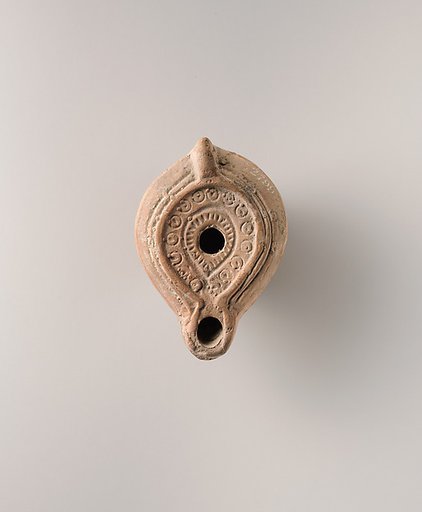 Terracotta oil lamp