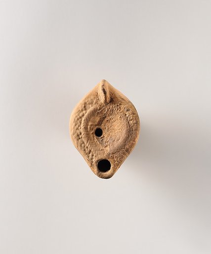 Terracotta oil lamp