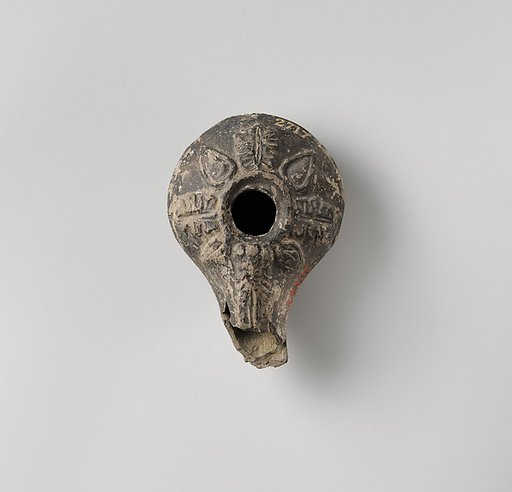 Terracotta oil lamp