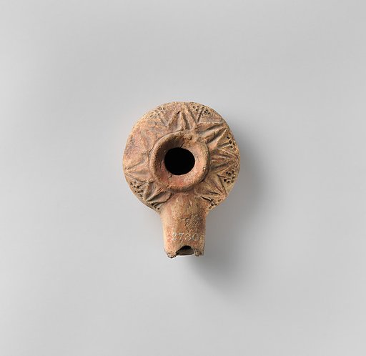 Terracotta oil lamp