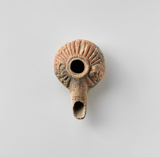 Terracotta oil lamp