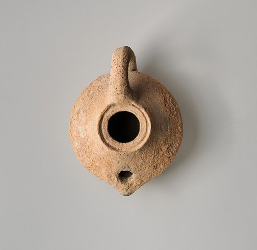 Terracotta oil lamp