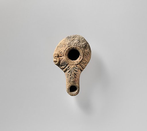 Terracotta oil lamp