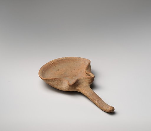 Terracotta handled saucer-shaped oil lamp