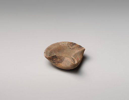 Terracotta saucer-shaped lamp