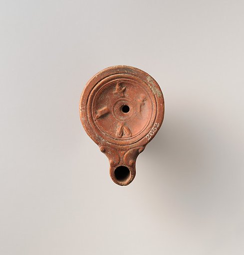 Terracotta oil lamp