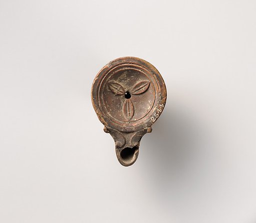 Terracotta oil lamp