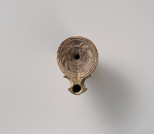 Terracotta oil lamp
