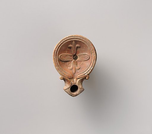 Terracotta oil lamp