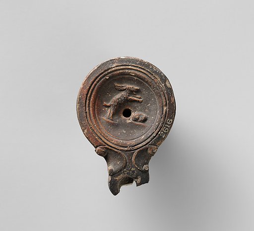 Terracotta oil lamp