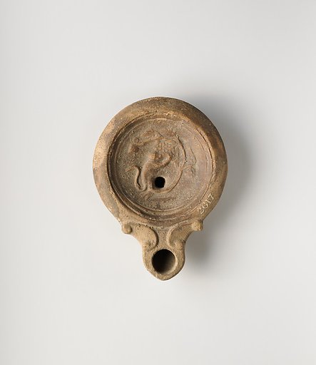Terracotta oil lamp