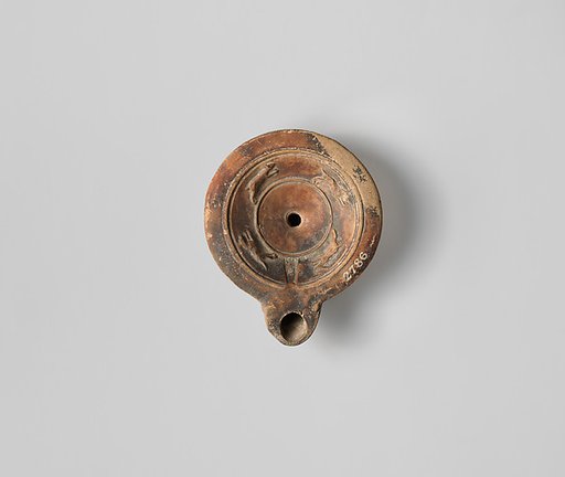 Terracotta oil lamp