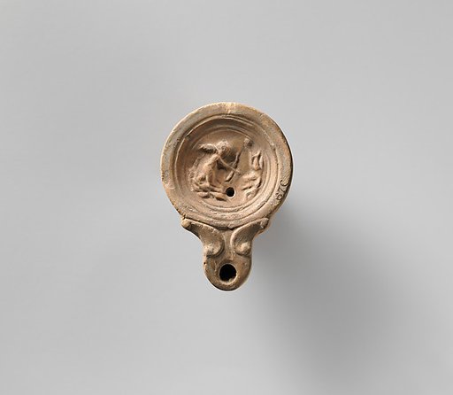 Terracotta oil lamp