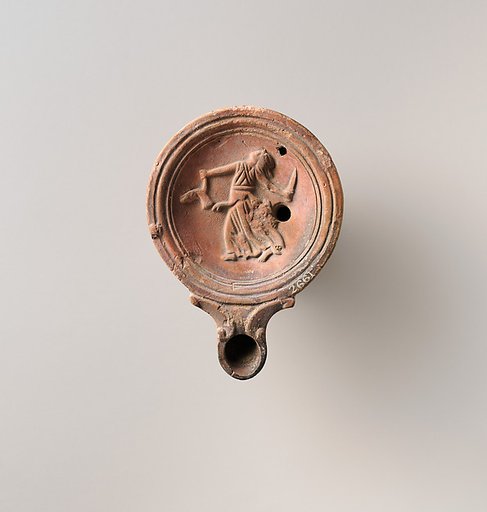 Terracotta oil lamp