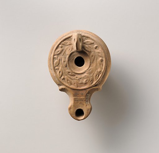 Terracotta oil lamp