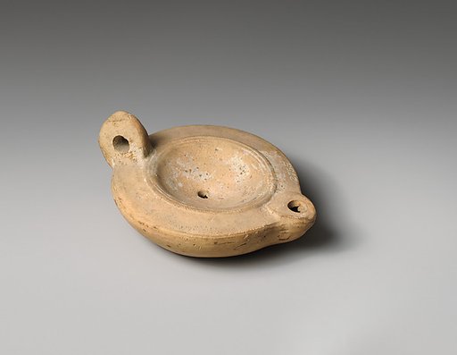Terracotta oil lamp