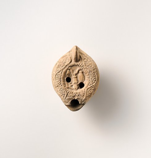 Terracotta oil lamp