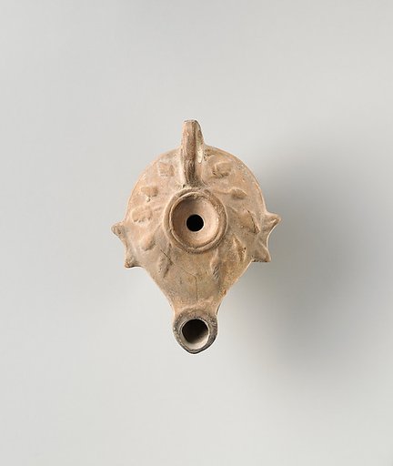 Terracotta oil lamp
