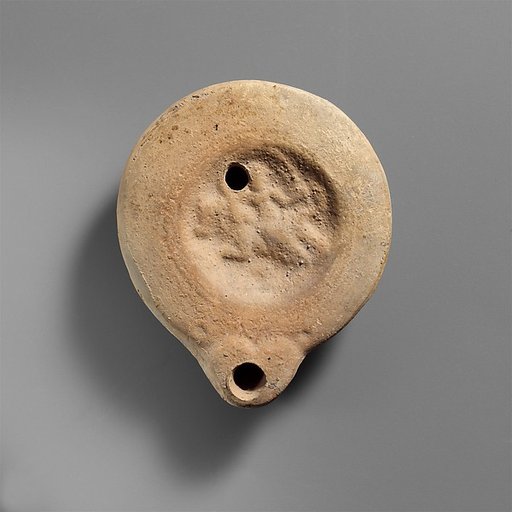 Terracotta oil lamp