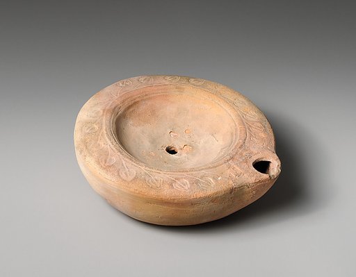 Terracotta oil lamp