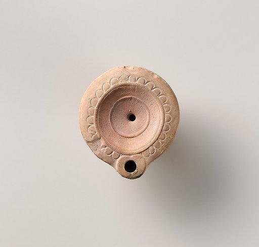 Terracotta oil lamp