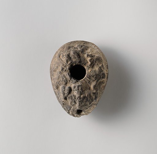 Terracotta oil lamp