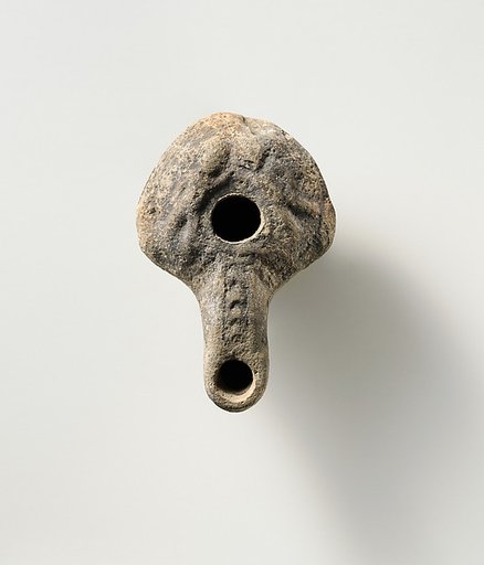 Terracotta oil lamp