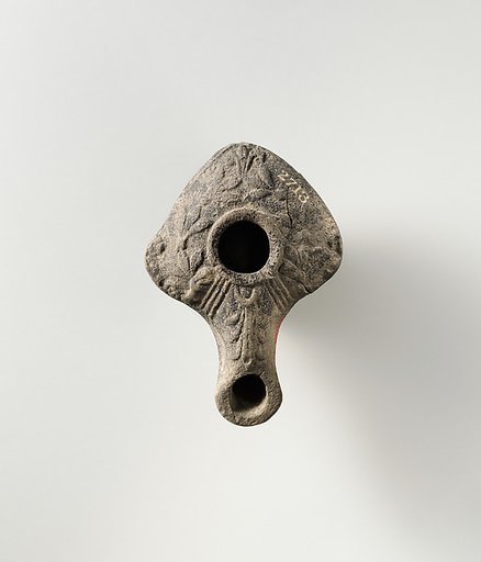 Terracotta oil lamp