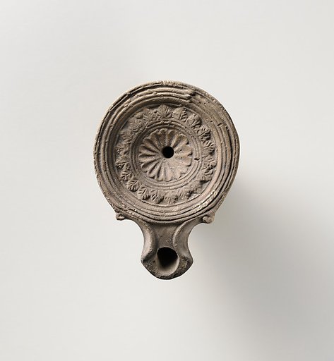 Terracotta oil lamp