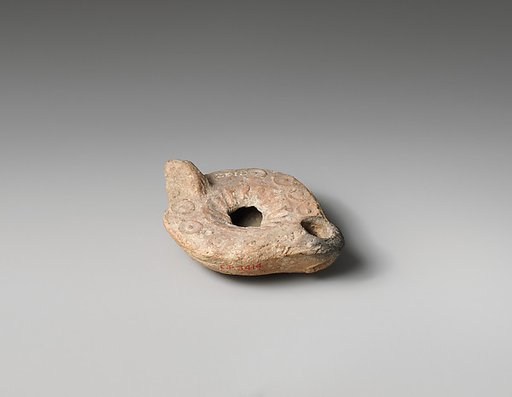 Terracotta oil lamp