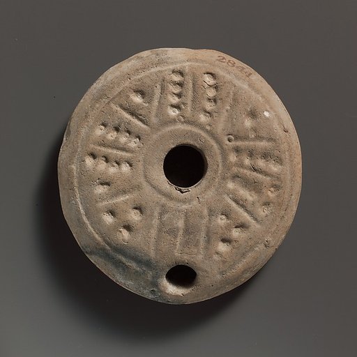 Terracotta oil lamp