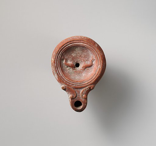 Terracotta oil lamp