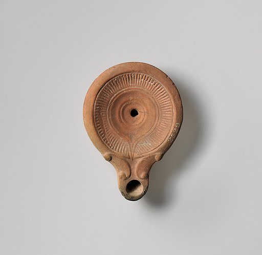Terracotta oil lamp