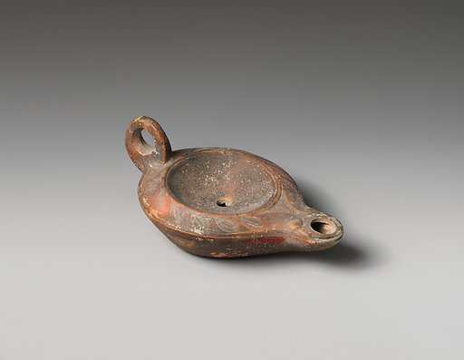 Terracotta oil lamp