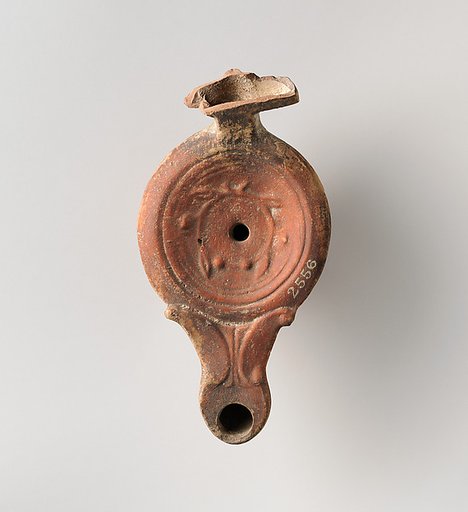 Terracotta oil lamp