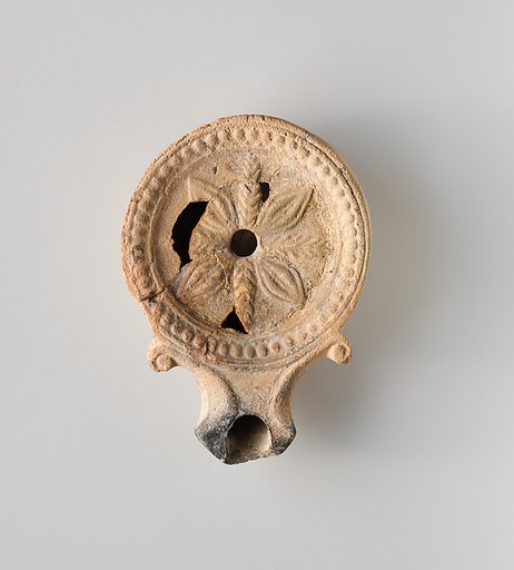 Terracotta oil lamp