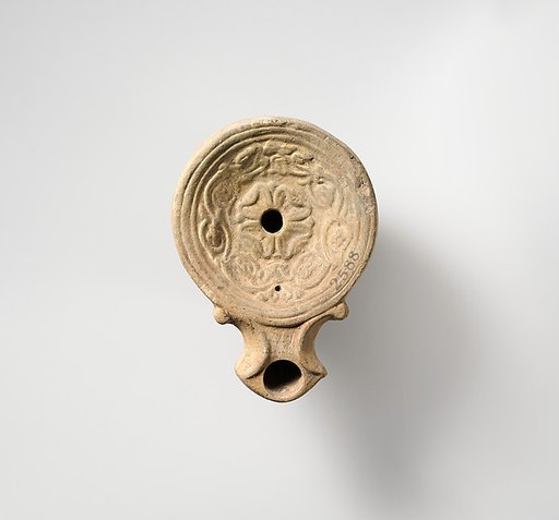 Terracotta oil lamp